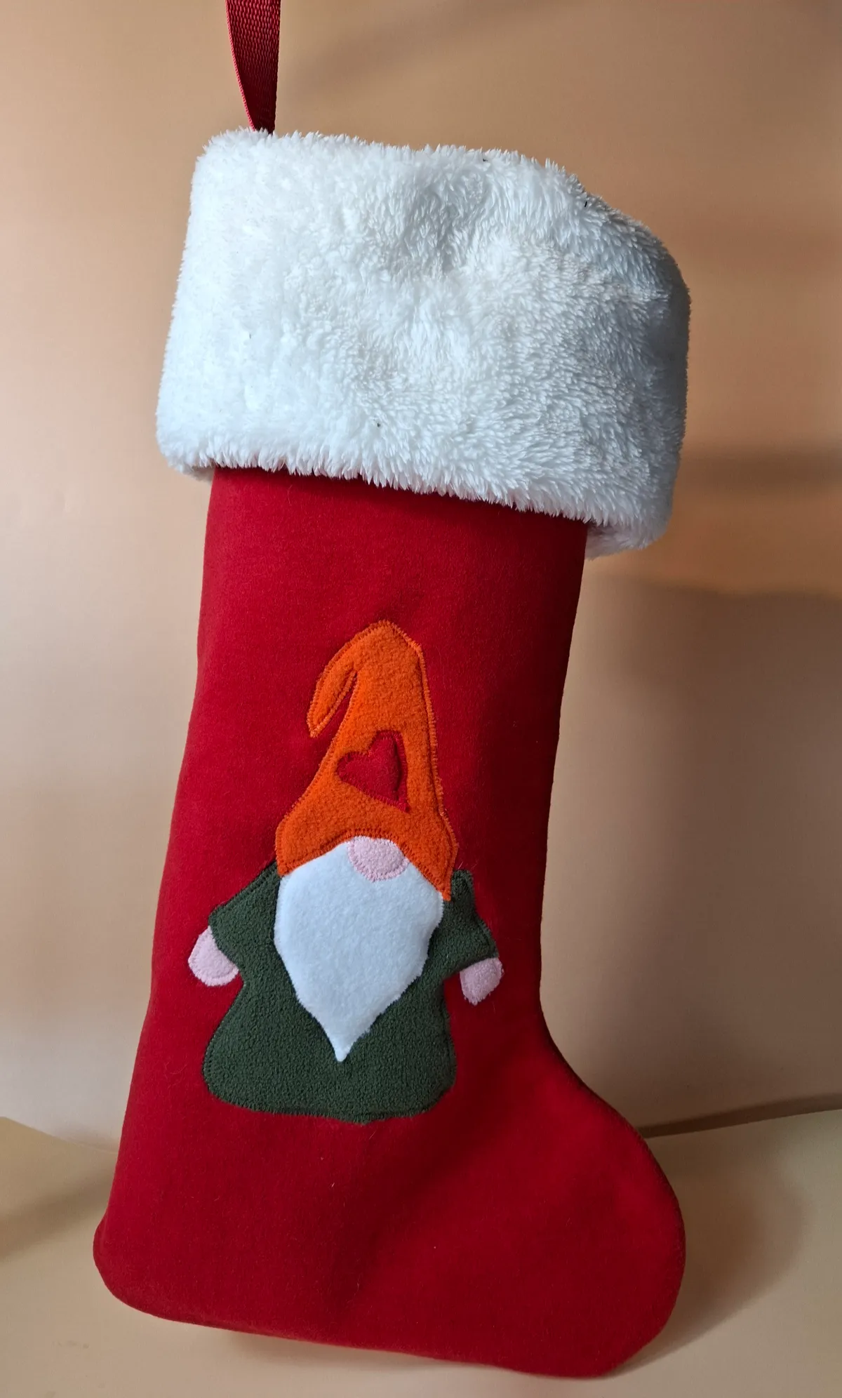 Vánoční punčocha na drobné dárky, ovoce a sladkosti pro děti.